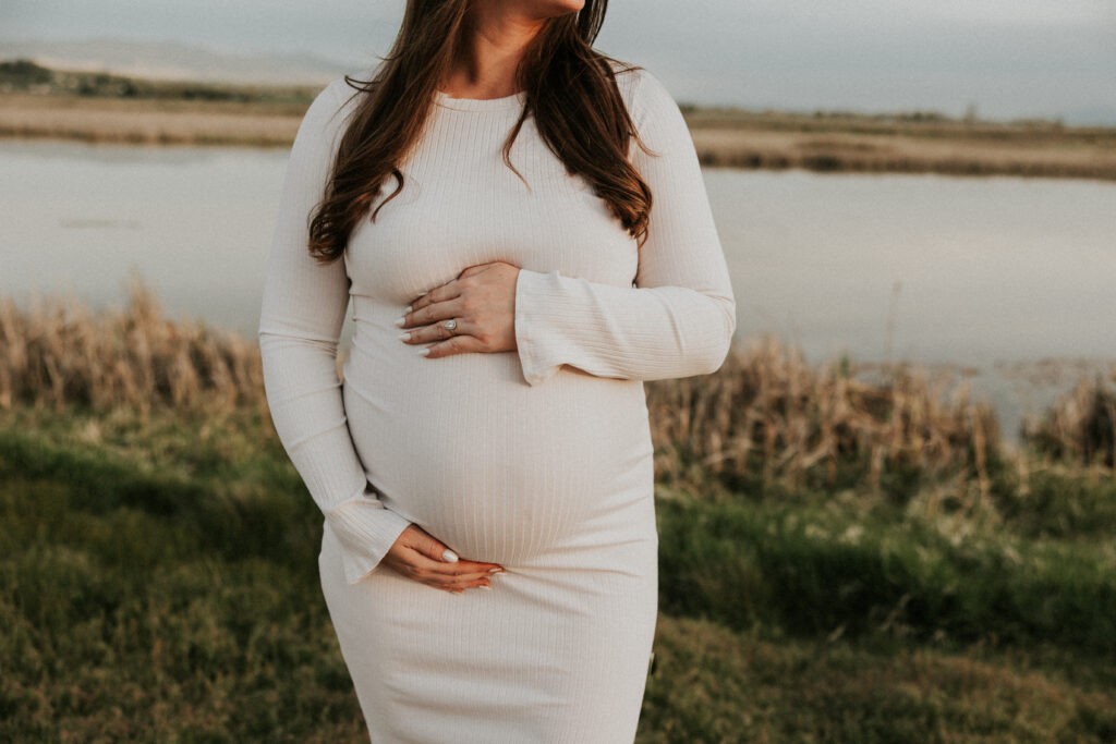 Bitterroot mountains dreamy artistic maternity photo with movement and soft golden sunlight