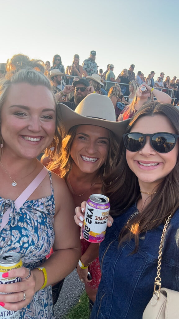 Montana photographer at country concert with friends